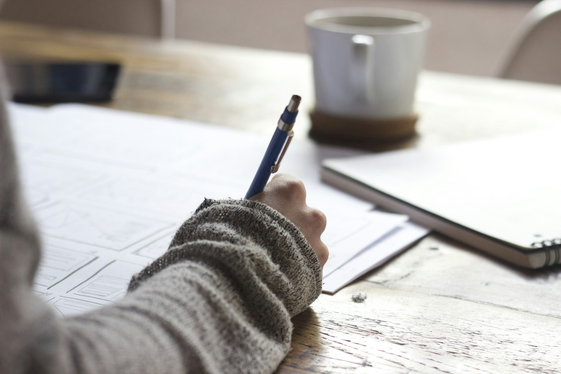 Notebook and plans used for property business planning